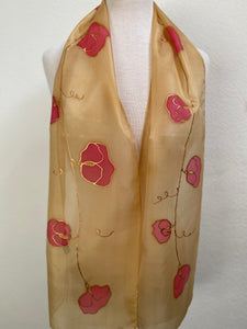 Hand painted silk neck scarf in caramel and red